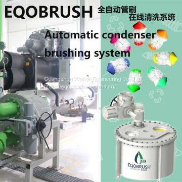 Cooling water treatment tube brushing for heat exchanger steam condenser