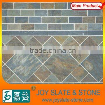 Natural rusty slate slabs decorated with stone walls