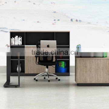 Wooden executive desk with small side desk