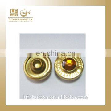 golden pocket rivet with yellow stone