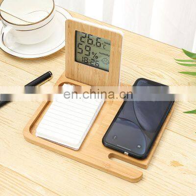 New arrival bedside mobile phone wireless fast charging wooden stand with 3 in 1 alarm clock with temperature and humidty