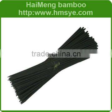 Bamboo garden stake in orchard for plant Dyed black color