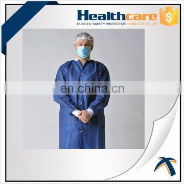 Disposable nonwoven lab gown with elastic or knitted cuff