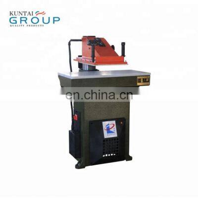 Hydraulic swing arm clicker press die cutting machine