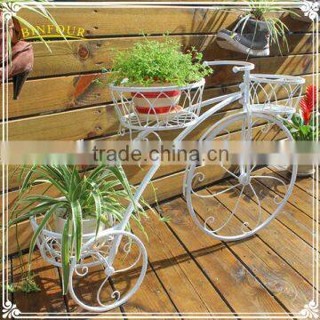 white bike shape metal planter stand for fairy garden