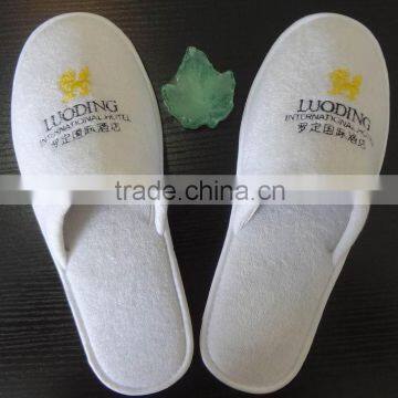 Closed toe hotel terry towel slipper with anti-slip fabric with dot