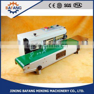 Continuous plastic bag sealing machine date code heat shrinking sealer