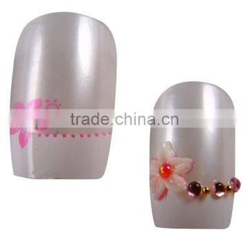 Silver artificial nails plus 3D flowers and pearls