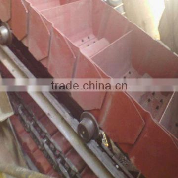 Individual charge conveyors one with flop chute and utilized hopper system