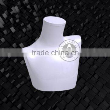 White glossy female mannequin bust without head