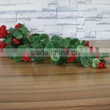 Artificial begonia flowers hanging