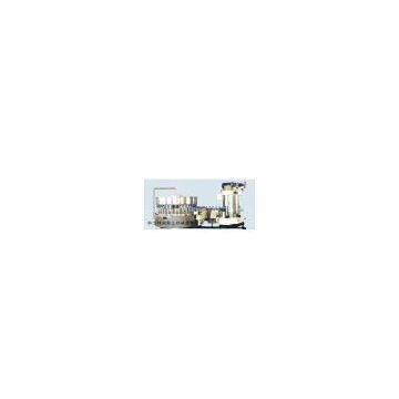 Carbonated soft drink filling and seaming machine