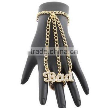 2 Pieces of Goldtone with Clear Iced Out Script Bad One Finger Ring Bracelet Hand Chain