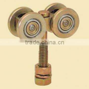 HANGING DOOR WHEELS FOR WOODEN DOOR USED AT A WAREHOUSE ETC WITH OTHER RELATIVE PARTS.