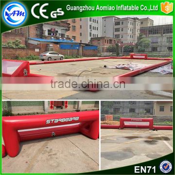 Hot New design red inflatable football field soap soccer field for sale