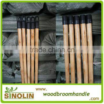 cleaning wooden broom stick with plastic greek screw