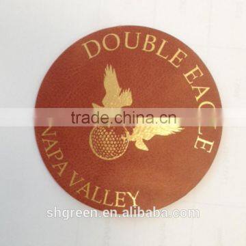 Unique round design hot stamping golden logo genuine leather patch