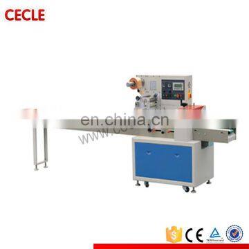 Manual flow pack machine for bread