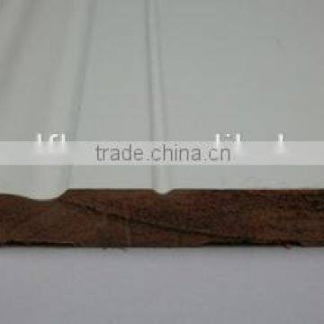white solid wood wall baseboard