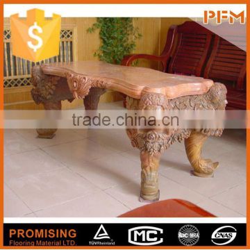 Hand carved small yellow stone table