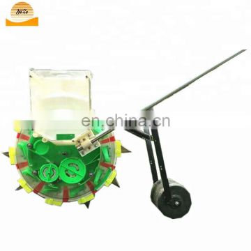 Hand operate manual corn bean seeder / grain peanut seeding machine width adjustable