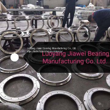 Light-loaded four point contact ball slewing ring with gear and flange