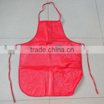 solid red color Plastic Kitchen Apron with non-woven backing