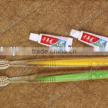 hot sale PS material hotel disposable toothbrush with 3g toothpaste