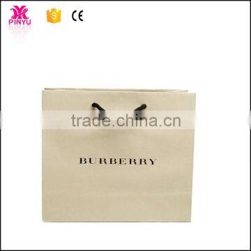 Brown color luxury shopping kraft paper hand bag with ABS handles