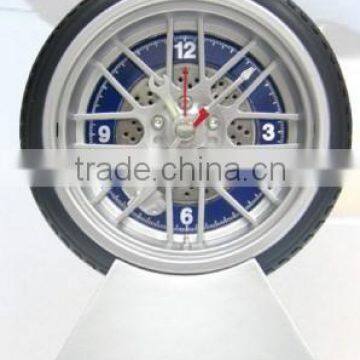 Popular tyre clock,wheel shaped analogue table clock with metal base for promotion