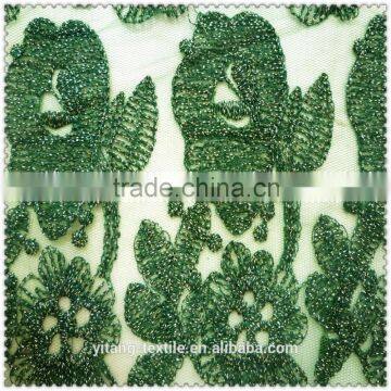 gold metallic embroidered green net fabric