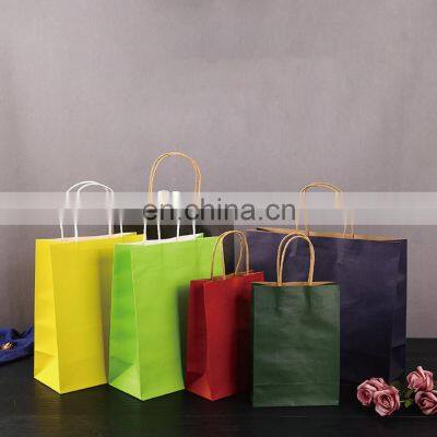 China factory wholesale surface handling customized printed kraft paper bags with twisted or flat handles