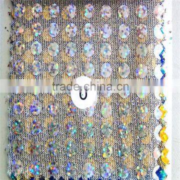 American knit with holo eye spangle fabric with rhinestones