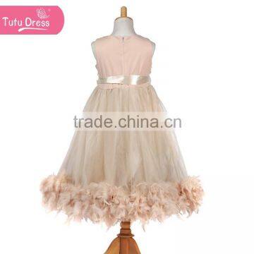 The Ivory Color Girls Boutique Dress With Fluffy Feather