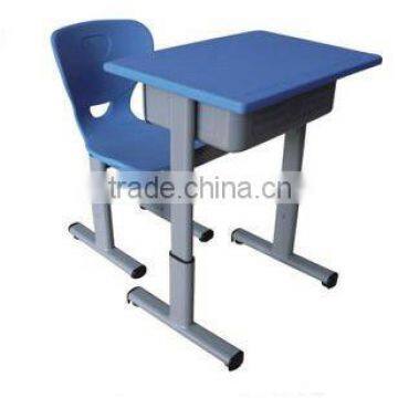 Single cheap school desk and chair