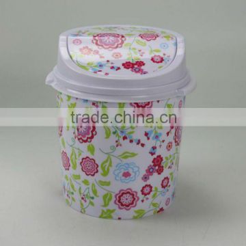 Plastic waste bin with lid