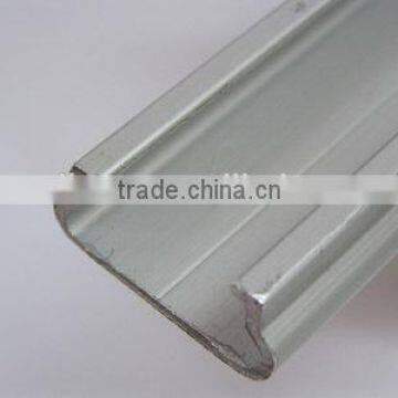 Aluminum and galvanized steel film lock channel and spring