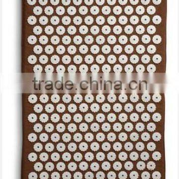 brown acupressure pad