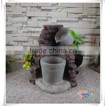 Rustic imitate clay pot on brick water fountains