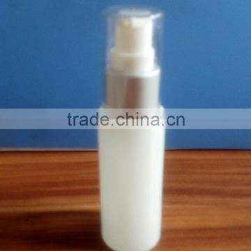 1 oz white glass lotion bottle with silver pump