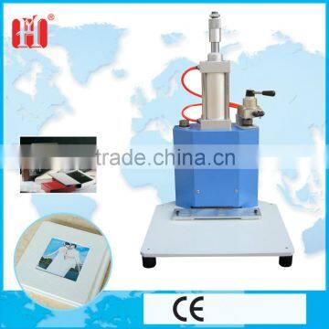 Pneumatic corner cutting machine for album cover