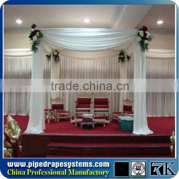 Telescopic pipe and drape system, four piece pipe poles upright