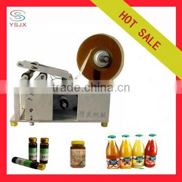 Semi automatic adhesive round bottle labeling machine for wine