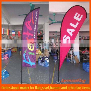 outdoor advertising tear drop flag in the snow
