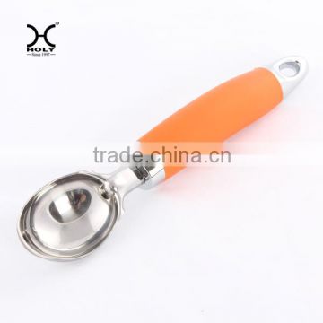 Ice cream spoon with 0range handle