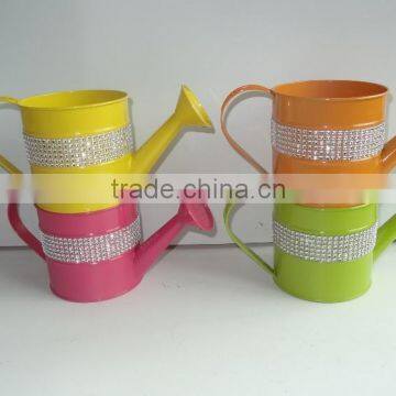 shinning color metal watering can