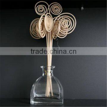 decorative curly reed sticks glass bottle