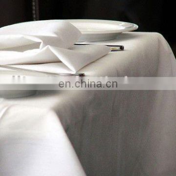 white color cotton dinner napkins and table cloth