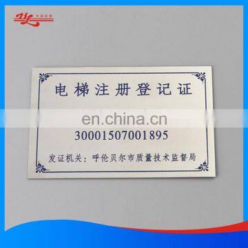 Chemically etched stainless steel nameplate for machine