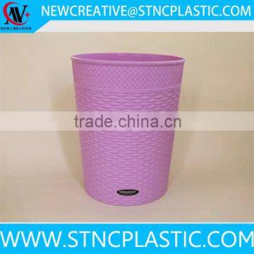 open top empty plastic household dustbin